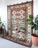 Vintage Turkish rug in a living room setting, pile rug, Turkish rug, vintage rug, portland, rug shop, bright colors, wild shaman, soft rug, bold color, Portland, Oregon, rug store, rug shop, local shop