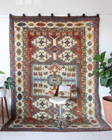 Vintage Turkish rug in a living room setting, pile rug, Turkish rug, vintage rug, portland, rug shop, bright colors, wild shaman, soft rug, bold color, Portland, Oregon, rug store, rug shop, local shop