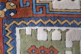 Vintage Turkish rug in a living room setting, pile rug, Turkish rug, vintage rug, portland, rug shop, bright colors, wild shaman, soft rug, bold color, Portland, Oregon, rug store, rug shop, local shop