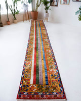 Vintage Turkish runner rug in a living room setting, pile rug, Turkish rug, vintage rug, portland, rug shop, bright colors, wild shaman, soft rug, bold color, Portland, Oregon, rug store, rug shop, local shop, antique rug