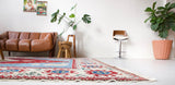 Vintage Turkish rug in a living room setting, pile rug, Turkish rug, vintage rug, portland, rug shop, bright colors, wild shaman, soft rug, bold color, Portland, Oregon, rug store, rug shop, local shop