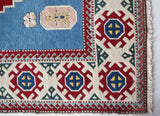 Vintage Turkish rug in a living room setting, pile rug, Turkish rug, vintage rug, portland, rug shop, bright colors, wild shaman, soft rug, bold color, Portland, Oregon, rug store, rug shop, local shop