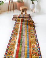 Vintage Turkish runner rug in a living room setting, pile rug, Turkish rug, vintage rug, portland, rug shop, bright colors, wild shaman, soft rug, bold color, Portland, Oregon, rug store, rug shop, local shop, antique rug
