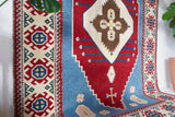 Vintage Turkish rug in a living room setting, pile rug, Turkish rug, vintage rug, portland, rug shop, bright colors, wild shaman, soft rug, bold color, Portland, Oregon, rug store, rug shop, local shop