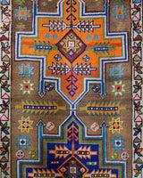 Vintage Turkish runner rug in a living room setting, pile rug, Turkish rug, vintage rug, portland, rug shop, bright colors, wild shaman, soft rug, bold color, Portland, Oregon, rug store, rug shop, local shop, antique rug