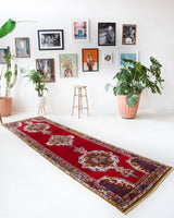 Vintage Turkish runner rug in a living room setting, pile rug, Turkish rug, vintage rug, portland, rug shop, bright colors, wild shaman, soft rug, bold color, Portland, Oregon, rug store, rug shop, local shop, antique rug