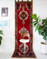 Vintage Turkish runner rug in a living room setting, pile rug, Turkish rug, vintage rug, portland, rug shop, bright colors, wild shaman, soft rug, bold color, Portland, Oregon, rug store, rug shop, local shop, antique rug