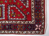 Vintage Turkish rug in a living room setting, pile rug, Turkish rug, vintage rug, portland, rug shop, bright colors, wild shaman, soft rug, bold color, Portland, Oregon, rug store, rug shop, local shop