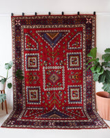 Vintage Turkish rug in a living room setting, pile rug, Turkish rug, vintage rug, portland, rug shop, bright colors, wild shaman, soft rug, bold color, Portland, Oregon, rug store, rug shop, local shop