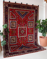 Vintage Turkish rug in a living room setting, pile rug, Turkish rug, vintage rug, portland, rug shop, bright colors, wild shaman, soft rug, bold color, Portland, Oregon, rug store, rug shop, local shop