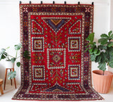 Vintage Turkish rug in a living room setting, pile rug, Turkish rug, vintage rug, portland, rug shop, bright colors, wild shaman, soft rug, bold color, Portland, Oregon, rug store, rug shop, local shop