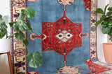 Vintage Turkish rug in a living room setting, pile rug, Turkish rug, vintage rug, portland, rug shop, bright colors, wild shaman, soft rug, bold color, Portland, Oregon, rug store, rug shop, local shop