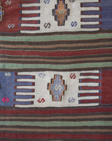 Vintage kilim rug in living room setting, old rug, antique rug, pastel colors, faded colors, Turkish rug, vintage rug, soft rug, Portland, Oregon, rug store, rug shop, local shop, earthy tones, earthy colors, warm colors