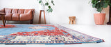 Vintage Turkish rug in a living room setting, pile rug, Turkish rug, vintage rug, portland, rug shop, bright colors, wild shaman, soft rug, bold color, Portland, Oregon, rug store, rug shop, local shop