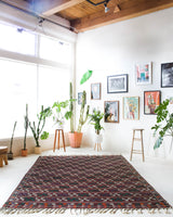 Vintage kilim rug in room decor setting, old rug, antique rug, pastel colors, faded colors, Turkish rug, vintage rug, soft rug, Portland, Oregon, rug store, rug shop, local shop, bold colors, bright colors, faded colors