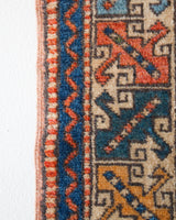Vintage Turkish runner rug in living room setting, old rug, antique rug, pastel colors, faded colors, Turkish rug, vintage rug, soft rug, Portland, Oregon, rug store, rug shop, local shop