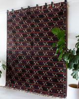 Vintage kilim rug in room decor setting, old rug, antique rug, pastel colors, faded colors, Turkish rug, vintage rug, soft rug, Portland, Oregon, rug store, rug shop, local shop, bold colors, bright colors, faded colors