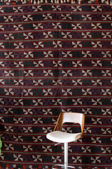 Vintage kilim rug in room decor setting, old rug, antique rug, pastel colors, faded colors, Turkish rug, vintage rug, soft rug, Portland, Oregon, rug store, rug shop, local shop, bold colors, bright colors, faded colors