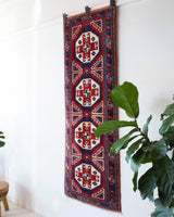 Vintage Turkish runner rug in a living room setting, pile rug, Turkish rug, vintage rug, portland, rug shop, bright colors, wild shaman, soft rug, bold color, Portland, Oregon, rug store, rug shop, local shop, antique rug