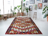 Vintage kilim rug in room decor setting, old rug, antique rug, pastel colors, faded colors, Turkish rug, vintage rug, soft rug, Portland, Oregon, rug store, rug shop, local shop, bold colors, bright colors, faded colors
