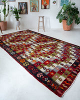 Vintage kilim rug in room decor setting, old rug, antique rug, pastel colors, faded colors, Turkish rug, vintage rug, soft rug, Portland, Oregon, rug store, rug shop, local shop, bold colors, bright colors, faded colors