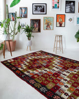 Vintage kilim rug in room decor setting, old rug, antique rug, pastel colors, faded colors, Turkish rug, vintage rug, soft rug, Portland, Oregon, rug store, rug shop, local shop, bold colors, bright colors, faded colors