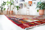 Vintage kilim rug in room decor setting, old rug, antique rug, pastel colors, faded colors, Turkish rug, vintage rug, soft rug, Portland, Oregon, rug store, rug shop, local shop, bold colors, bright colors, faded colors