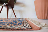 Vintage Turkish runner rug in living room setting, old rug, antique rug, pastel colors, faded colors, Turkish rug, vintage rug, soft rug, Portland, Oregon, rug store, rug shop, local shop