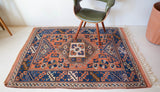 Vintage Turkish runner rug in living room setting, old rug, antique rug, pastel colors, faded colors, Turkish rug, vintage rug, soft rug, Portland, Oregon, rug store, rug shop, local shop