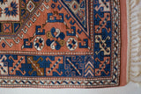 Vintage Turkish runner rug in living room setting, old rug, antique rug, pastel colors, faded colors, Turkish rug, vintage rug, soft rug, Portland, Oregon, rug store, rug shop, local shop
