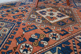 Vintage Turkish runner rug in living room setting, old rug, antique rug, pastel colors, faded colors, Turkish rug, vintage rug, soft rug, Portland, Oregon, rug store, rug shop, local shop