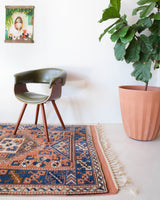 Vintage Turkish runner rug in living room setting, old rug, antique rug, pastel colors, faded colors, Turkish rug, vintage rug, soft rug, Portland, Oregon, rug store, rug shop, local shop