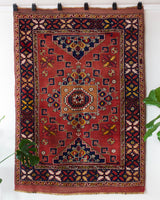 Vintage Turkish rug in a living room setting, pile rug, Turkish rug, vintage rug, portland, rug shop, bright colors, wild shaman, soft rug, bold color, Portland, Oregon, rug store, rug shop, local shop, antique rug