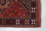 Vintage Turkish rug in a living room setting, pile rug, Turkish rug, vintage rug, portland, rug shop, bright colors, wild shaman, soft rug, bold color, Portland, Oregon, rug store, rug shop, local shop, antique rug