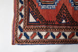 Vintage Turkish rug in a living room setting, pile rug, Turkish rug, vintage rug, portland, rug shop, bright colors, wild shaman, soft rug, bold color, Portland, Oregon, rug store, rug shop, local shop, antique rug