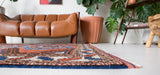 Vintage Turkish rug in a living room setting, pile rug, Turkish rug, vintage rug, portland, rug shop, bright colors, wild shaman, soft rug, bold color, Portland, Oregon, rug store, rug shop, local shop, antique rug