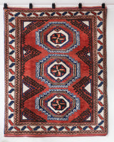 Vintage Turkish rug in a living room setting, pile rug, Turkish rug, vintage rug, portland, rug shop, bright colors, wild shaman, soft rug, bold color, Portland, Oregon, rug store, rug shop, local shop, antique rug