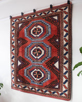 Vintage Turkish rug in a living room setting, pile rug, Turkish rug, vintage rug, portland, rug shop, bright colors, wild shaman, soft rug, bold color, Portland, Oregon, rug store, rug shop, local shop, antique rug