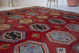 Vintage Turkish rug in a living room setting, pile rug, Turkish rug, vintage rug, portland, rug shop, bright colors, wild shaman, soft rug, bold color, Portland, Oregon, rug store, rug shop, local shop, antique rug