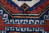 Vintage Turkish rug in a living room setting, pile rug, Turkish rug, vintage rug, portland, rug shop, bright colors, wild shaman, soft rug, bold color, Portland, Oregon, rug store, rug shop, local shop, antique rug