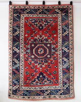 Vintage Turkish rug in living room setting, old rug, antique rug, pastel colors, faded colors, Turkish rug, vintage rug, soft rug, Portland, Oregon, rug store, rug shop, local shop