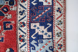Vintage Turkish rug in living room setting, old rug, antique rug, pastel colors, faded colors, Turkish rug, vintage rug, soft rug, Portland, Oregon, rug store, rug shop, local shop