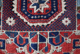Vintage Turkish rug in living room setting, old rug, antique rug, pastel colors, faded colors, Turkish rug, vintage rug, soft rug, Portland, Oregon, rug store, rug shop, local shop