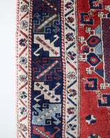 Vintage Turkish rug in living room setting, old rug, antique rug, pastel colors, faded colors, Turkish rug, vintage rug, soft rug, Portland, Oregon, rug store, rug shop, local shop