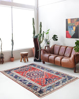 Vintage Turkish rug in living room setting, old rug, antique rug, pastel colors, faded colors, Turkish rug, vintage rug, soft rug, Portland, Oregon, rug store, rug shop, local shop