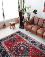 Vintage Turkish rug in living room setting, old rug, antique rug, pastel colors, faded colors, Turkish rug, vintage rug, soft rug, Portland, Oregon, rug store, rug shop, local shop