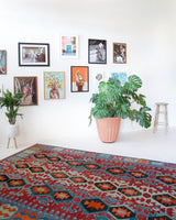 Vintage kilim rug in living room setting, bright colors, wild shaman, soft rug, bold color, Portland, Oregon, rug store, rug shop, local shop, vintage rug, modern kilim, warm colors