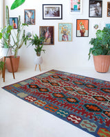 Vintage kilim rug in living room setting, bright colors, wild shaman, soft rug, bold color, Portland, Oregon, rug store, rug shop, local shop, vintage rug, modern kilim, warm colors
