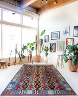 Vintage kilim rug in living room setting, bright colors, wild shaman, soft rug, bold color, Portland, Oregon, rug store, rug shop, local shop, vintage rug, modern kilim, warm colors