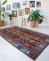Vintage kilim rug in living room setting, bright colors, wild shaman, soft rug, bold color, Portland, Oregon, rug store, rug shop, local shop, vintage rug, modern kilim, warm colors